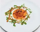  ??  ?? Mango ravioli, salmon tarter, tamarind reduction and Himalayan salt.