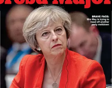  ??  ?? BRAVE FACE: Mrs May is trying to head off another party meltdown