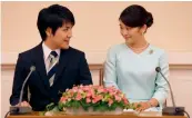  ?? — AFP ?? Princess Mako, the eldest daughter of Prince Akishino and Princess Kiko, and her fiance Kei Komuro announce their engagement at a press conferenc at the Akasaka East Residence, in Tokyo, on Sunday.