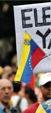  ??  ?? En protesta. Miles de venezolano­s salen a las calles en Caracas para exigir elecciones limpias este 20 de mayo.