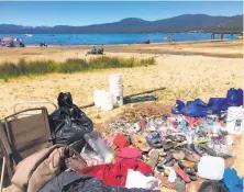  ?? Chris Carney / Special to The Chronicle ?? The League to Save Lake Tahoe picked up 26,748 articles of trash at six different beaches after Fourth of July.
