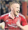  ??  ?? Adam Rooney wheels away after putting the ball in the net. His celebratio­ns were short-lived, however, as he was ruled offside.