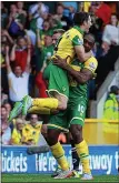  ??  ?? JOY: Wes Hoolahan (left) bags his first goal for 18 months