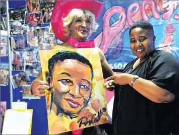  ?? PICTURE: BABALWA DHLAMINI ?? IN THE FRAME: Masego Panyane, a happy Tim Patch aka Pricasso client, at the Sexpo 2017 being held in the Sandton Convention Centre.