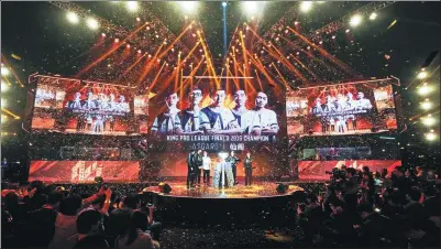  ?? PROVIDED TO CHINA DAILY ?? Profession­al Honor of Kings players from the ASGARD Xiange team celebrate after winning Tencent’s 2016 King Pro League Finals in Shanghai last December.