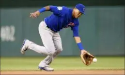  ?? NICK WASS — THE ASSOCIATED PRESS FILE ?? Cubs shortstop Addison Russell fields a ground ball last season in Washington.