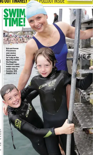  ??  ?? Kai and Aaron Fitzsimons and Janice Doyle went for a dip at the New Pier while the Regatta Festival’s open water race was under way on Sunday.