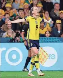  ?? TERTIUS PICKARD/AP ?? Sweden’s Kosovare Asllani celebrates after scoring her team’s second goal against Australia on Saturday in Brisbane, Australia.