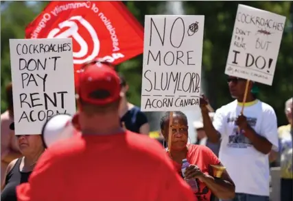  ?? BARRY GRAY, THE HAMILTON SPECTATOR ?? Dozens attended a tenant rally held by ACORN outside Hamilton City Hall Tuesday during the noon hour.