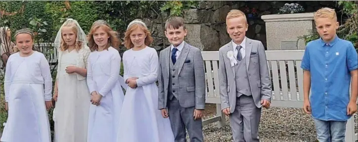  ??  ?? Pupils from Kilmacanog­ue NS who received their First Holy Communion at St Mary’s church in Enniskerry.