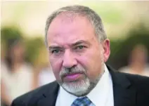  ?? Abir Sultan / AFP ?? The hard-line Israeli defence minister Avigdor Lieberman has banned travel by Mr Al Madani for ‘subversive activities’.