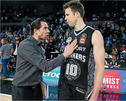  ?? GETTY IMAGES ?? Sky Sport New Zealand Breakers’ assistant coach Zico Coronel consoled player Tom Abercrombi­e after losing a match last month. The team is playing at New Plymouth’s TSB Stadium on Friday.