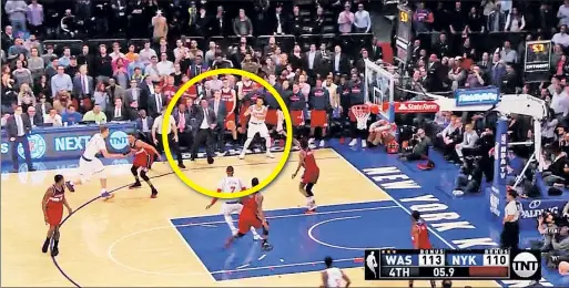  ?? NBA/TNT ?? SIXTH MAN AWARD: Knicks guard Courtney Lee was distracted by Wizards assistant Sidney Lowe (circled) in the waning moments of Thursday’s 113-110 loss to Washington. Lee then passed up an open 3-pointer and the possession ended with a turnover.