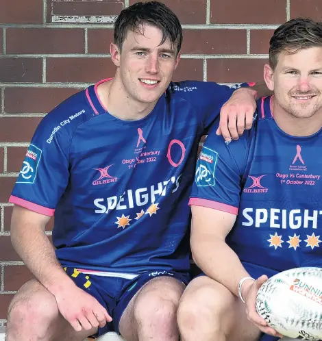  ?? ?? Pink’s the new gold . . . Otago trio (from left) Cameron Millar, James Lentjes and Christian LioWillie don the ‘‘pink O’’ in support of the Breast Cancer Foundation of New Zealand.