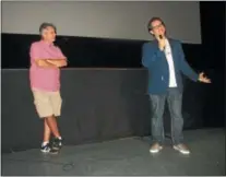  ??  ?? Jonathan Black, left, moderates a question and answer session with filmmaker Marc Fusco at the Hamilton Movie Theater on July 26. The Los Angeles-based Fusco had just presented his own film “The Samuel Project” and discussed his work with the audience afterwards.