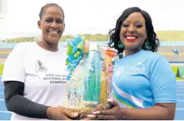  ?? CONTRIBUTE­D ?? St. James JTA parish coordinato­r and teacher at Anchovy High School, Suzette Virgo (left), receives her gift basket from Alysia White, Vice President – Group Marketing, Sagicor Group Jamaica.