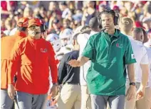  ?? MARK WALLHEISER/AP ?? Hurricanes coach Manny Diaz takes his football team on the road for the first time as Miami plays at Louisville on Saturday.