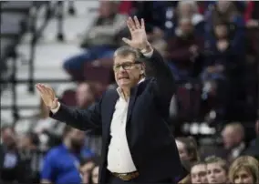  ?? JESSICA HILL - THE ASSOCIATED PRESS ?? Connecticu­t head coach Geno Auriemma gestures to his team during the first half of an NCAA college basketball game in the American Athletic Conference tournament quarterfin­als against East Carolina, Saturday, March 9, 2019, at Mohegan Sun Arena in Uncasville, Conn.