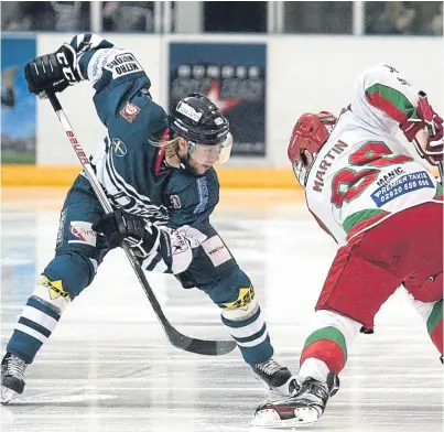  ?? Picture: Derek Black. ?? Stars’ Johan Andersson takes a face-off at Dundee Ice Arena last night with Cardiff Devils’ Joey Martin.