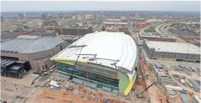  ?? MIKE DE SISTI/MILWAUKEE JOURNAL SENTINEL ?? Constructi­on is underway at the site of the future new $524 million arena in Milwaukee where the Milwaukee Bucks will play. The team has yet to find a partner to sponsor naming rights.