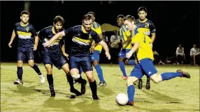  ?? Photo courtesy of JBU Sports Informatio­n ?? John Brown University sophomore Conner Haney takes a shot against Texas Wesleyan on Thursday night in the Golden Eagles’ 2-0 win over the Rams.