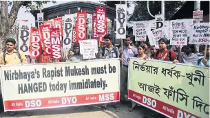  ?? EPA ?? Activists in Calcutta, India, on Wednesday demand the death penalty for convicted gangrapist Mukesh Singh. He was convicted of gangraping a 23-yearold female student on a bus in New Delhi in December, 2012. He said in an interview that future rape...