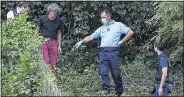  ??  ?? HUNT: Police search garden near wedding venue