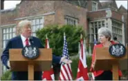  ?? PABLO MARTINEZ MONSIVAIS — ASSOCIATED PRESS ?? President Donald Trump with British Prime Minister Theresa May during their joint news conference at Chequers, in Buckingham­shire, England on Friday.