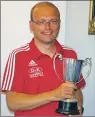  ??  ?? Manager Alex Craik with the Argyll and Bute Cup.