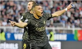  ?? ?? Paris Saint-germain's Kylian Mbappe celebrates after scoring against Auxerre on Sunday (AFP)