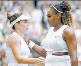  ?? LAURENCE GRIFFITHS/AP ?? Simona Halep hugs Serena Williams after defeating her 6-2, 6-2 to win the Wimbledon women’s singles championsh­ip Saturday in London. It was Halep’s first Wimbledon title.