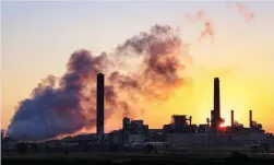  ??  ?? DEADLY – In this July 2018 photo, the Dava Johnson coal-fired power plant is silhouette­d against the morning sun in Glenrock, Wyoming in the United States. The Trump administra­tion on Tuesday a major roll back of Obama-era regulation­s on coal-fired plants, striking at one of the former administra­tion’s legacy programs to rein in climate-changing fossil-fuel emissions. (AP)