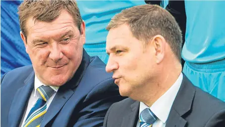  ??  ?? Tommy Wright, left, and Steve Brown have a job on their hands at St Johnstone.