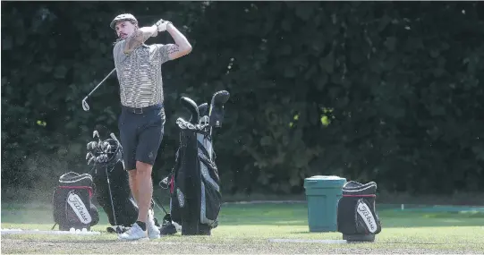  ?? TONY CALDWELL ?? Erik Karlsson hits some balls on the range during the Bell Ottawa Senators Charity Golf Classic at the Royal Ottawa Golf Club in Gatineau on Monday.