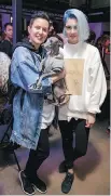  ??  ?? PET FRIENDLY: Fashion influencer­s, ZOÏ Agency’s Patricia Larivière and Sephora PR director Marjorie Roux with their adorable pup (in hoodie).