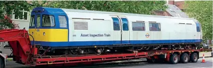  ?? JAMIE SQUIBBS ?? London Undergroun­d Asset Inspection Train driving motor car No. 3313 sits on a low loader bound for the scrapyard on June 25. However, its journey was delayed due to the lorry breaking down a short distance from Northfield­s depot.