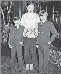  ?? Tony Palmieri Penske Media/Shuttersto­ck ?? AN INFLUENTIA­L MOM Vanderbilt with her sons Anderson Cooper, left, and Carter Cooper at one of their mother’s fashion shows in 1978.