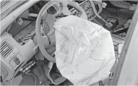  ?? Joe Raedle / Getty Images ?? This deployed air bag was in a 2001 Honda Accord. At least one air bag supplier examined Takata’s design and refused to duplicate it out of safety concerns.