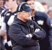  ?? Chuck Burton / Associated Press ?? Jim Grobe was 77-82 in 13 seasons at Wake Forest and coached the Deacons to an ACC title in 2006.