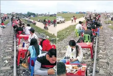  ?? FACEBOOK ?? People seen lunching on the railway lines in Por Sen Chey district earlier in August.