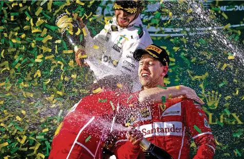  ?? EPA ?? Der 29-jährige Deutsche Sebastian Vettel bescherte Ferrari und der Formel 1 einen Freudentag.