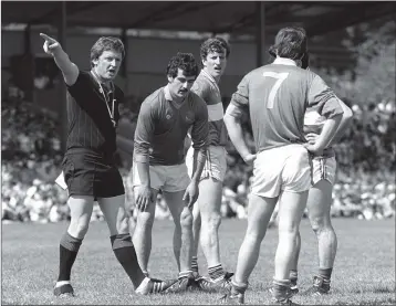  ??  ?? Referee Carthage Buckley sends off Wicklow’s Nick O’Neill, second from left, and Laois’ Willie Brennan (hidden behind Mick O’Toole (7)) during the Leinster cham[pionship clash in Aughrim in 1986.