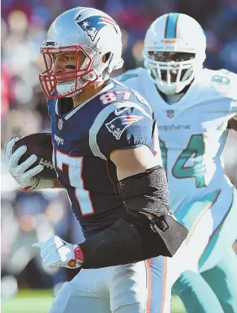  ?? STAFF FILE PHOTO BY CHRISTOPHE­R EVANS ?? PRESSURE’S ON: Rob Gronkowski and the Patriots aren’t used to must-win games in September, but with Miami making noise in the AFC East, today seems to qualify.