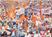  ?? PTI ?? People representi­ng various Maharashtr­ian tribal communitie­s stage a protest against state goverment for completion of various demands in Mumbai