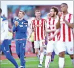  ?? OLI SCARFF/AFP ?? Stoke City defender Ryan Shawcross (centre) and teammates applaud the fans following their English Premier League match against Crystal Palace at the Bet365 Stadium on Saturday.