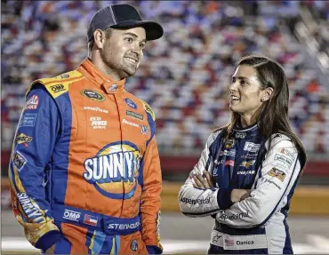  ?? CHUCK BURTON / AP 2016 ?? Danica Patrick (right) and Ricky Stenhouse Jr. dated for five years before a November breakup. Stenhouse is coming off the best season of his NASCAR career. Building on that momentum will be his goal this year.