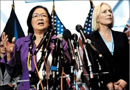  ?? ALEX WONG/GETTY ?? Sens. Mazie Hirono and Kirsten Gillibrand defend Christine Blasey Ford on Thursday. Ford has accused nominee Brett Kavanaugh of sexual assault at a high school party in the ’80s.