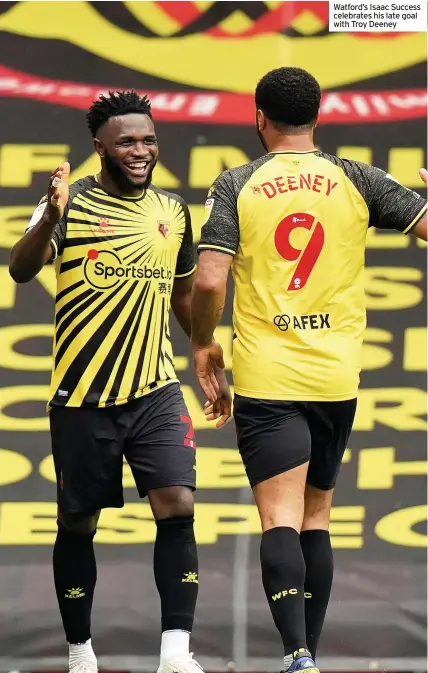  ??  ?? Watford’s Isaac Success celebrates his late goal with Troy Deeney