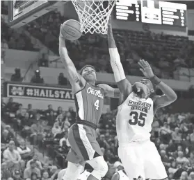  ?? SPRUCE DERDEN-USA TODAY SPORTS ?? Ole Miss guard Breein Tyree scored 20 of his career-high 24 points in the second half against MSU Tuesday.