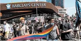  ?? BYRON SMITH/THE NEW YORK TIMES ?? Black Lives Matter protesters, who are calling for racial justice and changes to policing, demonstrat­e June 19 outside an arena in the Brooklyn borough of New York.